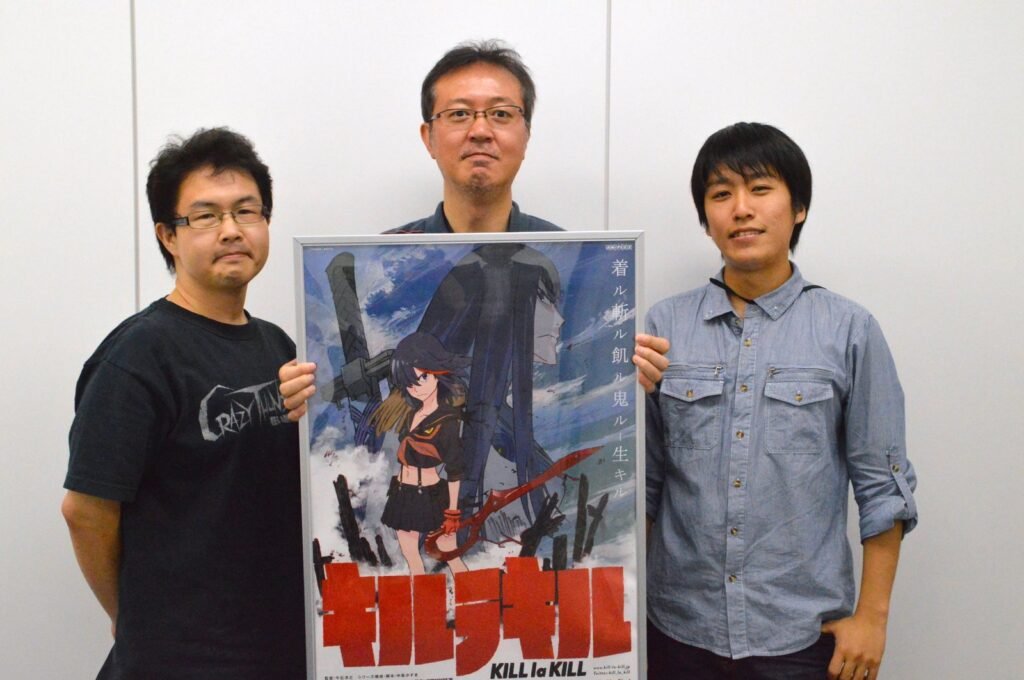 Staff de Studio Trigger: Masahiko Otsuka, Kazuya Masumoto y Tatsuru Tatemoto.