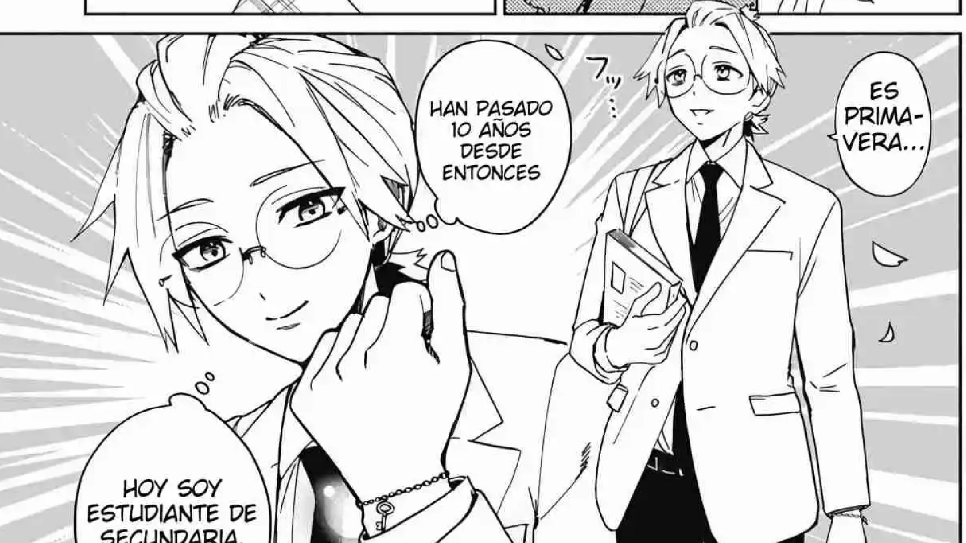 Korekishi con el uniforme escolar, hay un plano de cerca donde tiene el brazo levantado y se ve una pulsera en su muñeca y otra donde está parado, sosteniendo un libro